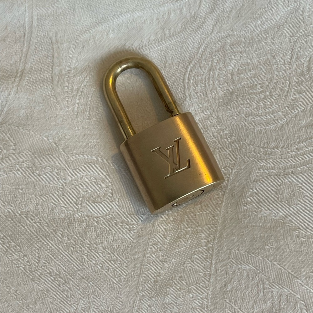 💯% Authentic Louis Vuitton Gold Padlock Only !